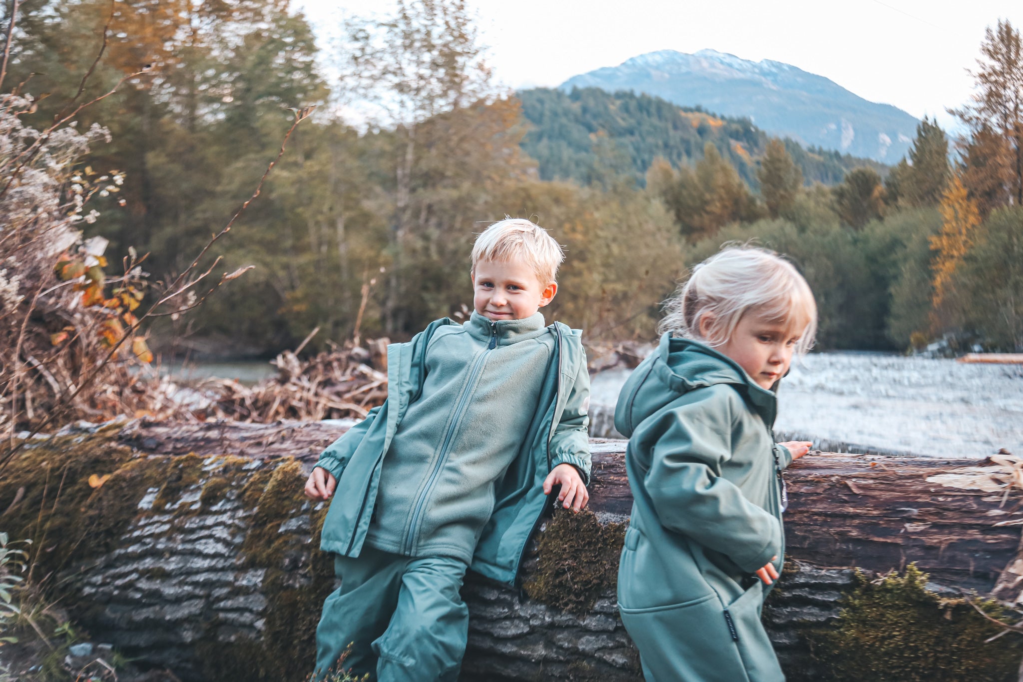 Kids wearing cozy fleece jackets from KidORCA during outdoor play
