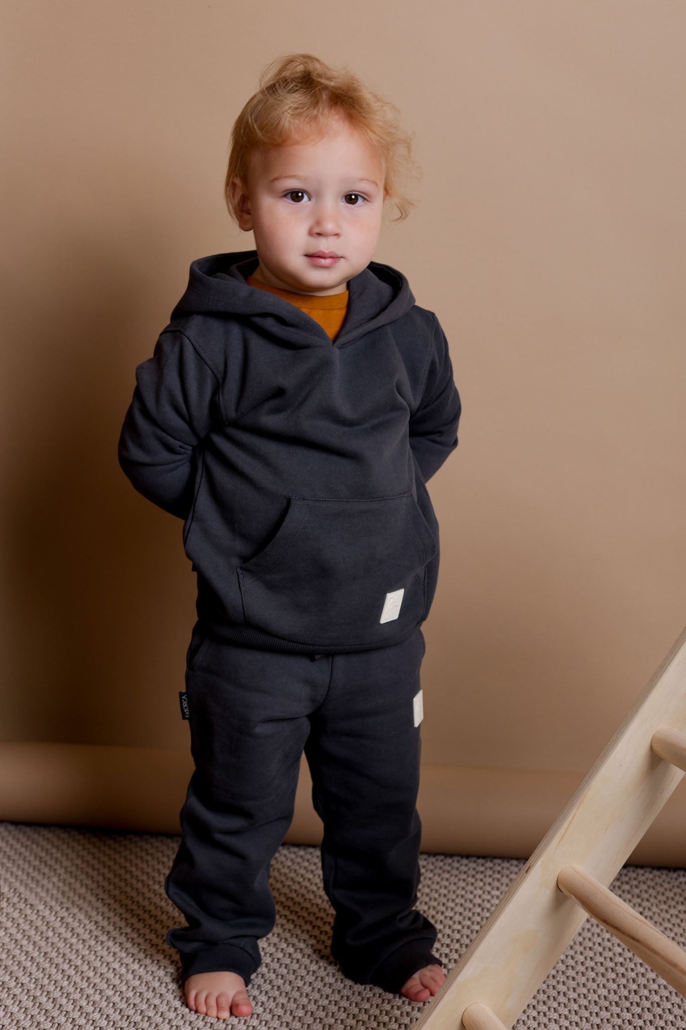 Child wearing lava brushed terry sweatpants – side view with elastic waist