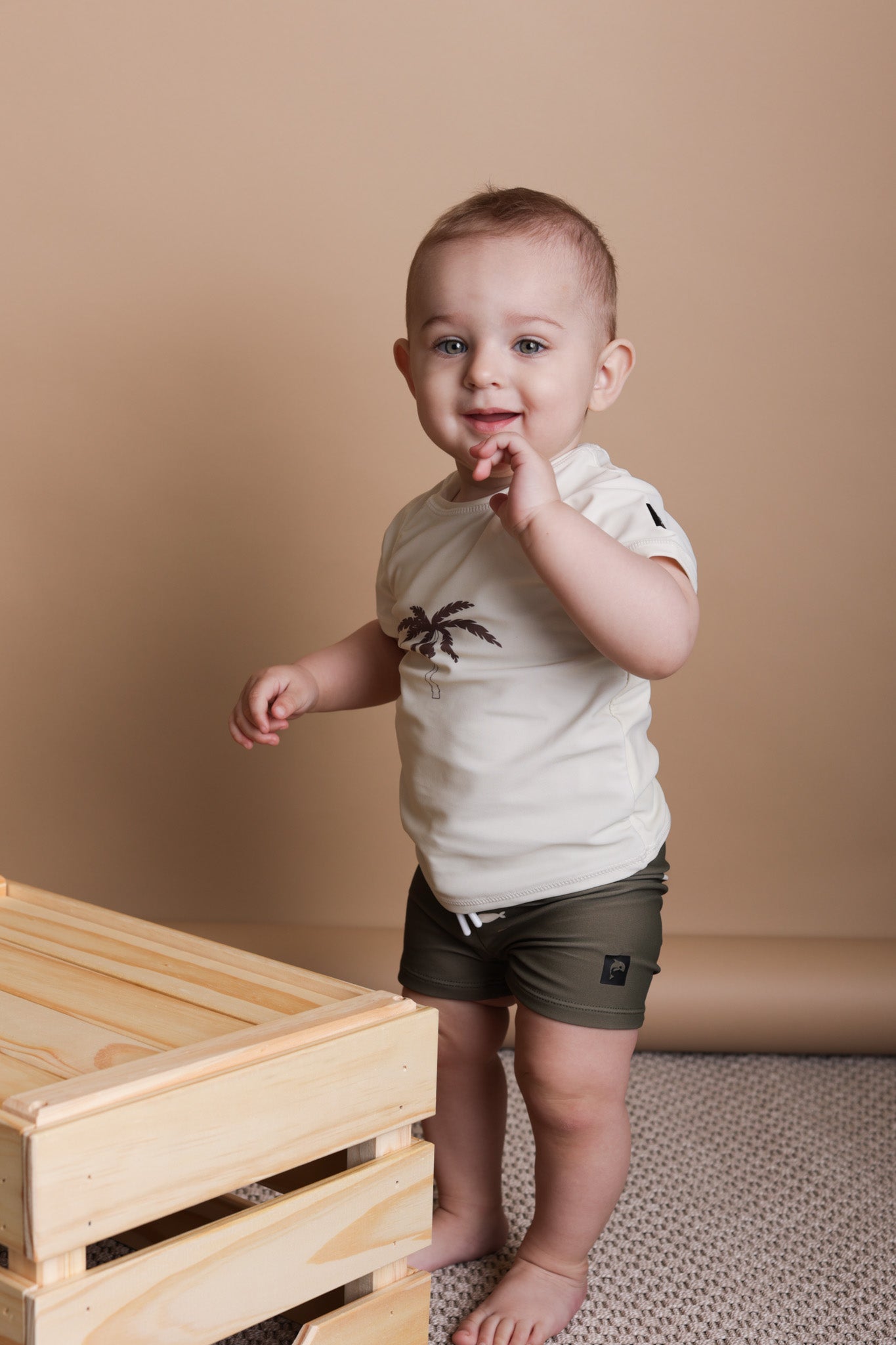 Boy wearing Trout Kalamata boardie shorts – side view with mesh liner
