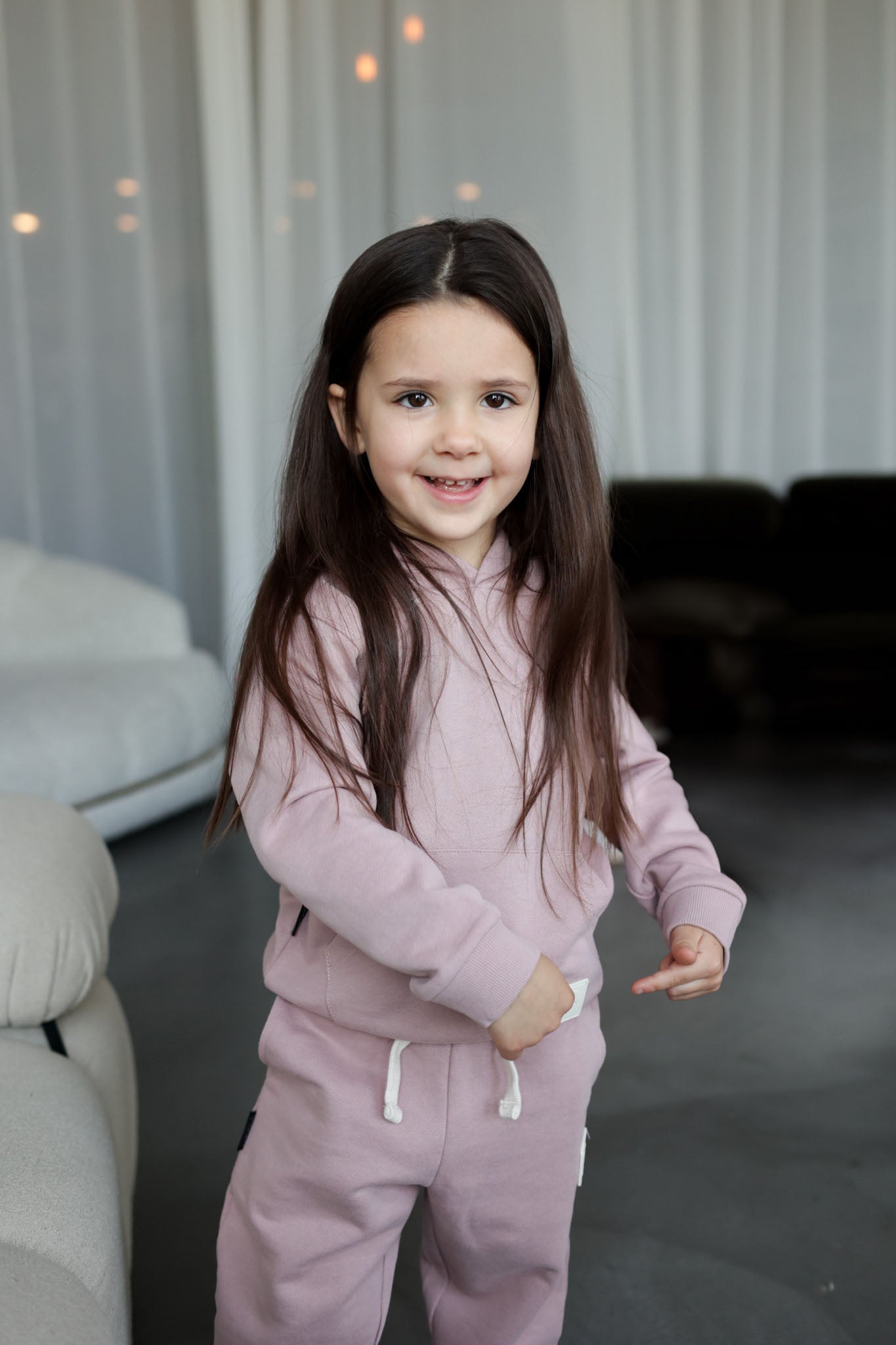 Child wearing wheat brushed terry sweatpants – side view with elastic waist