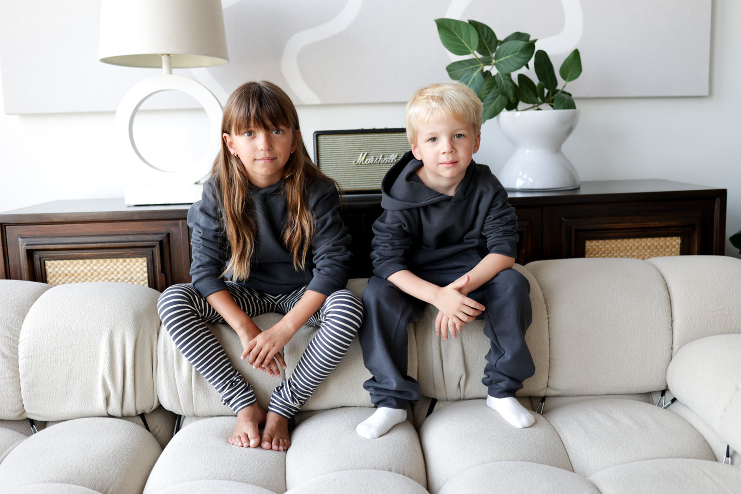 Child wearing lava brushed terry sweatpants – side view with elastic waist