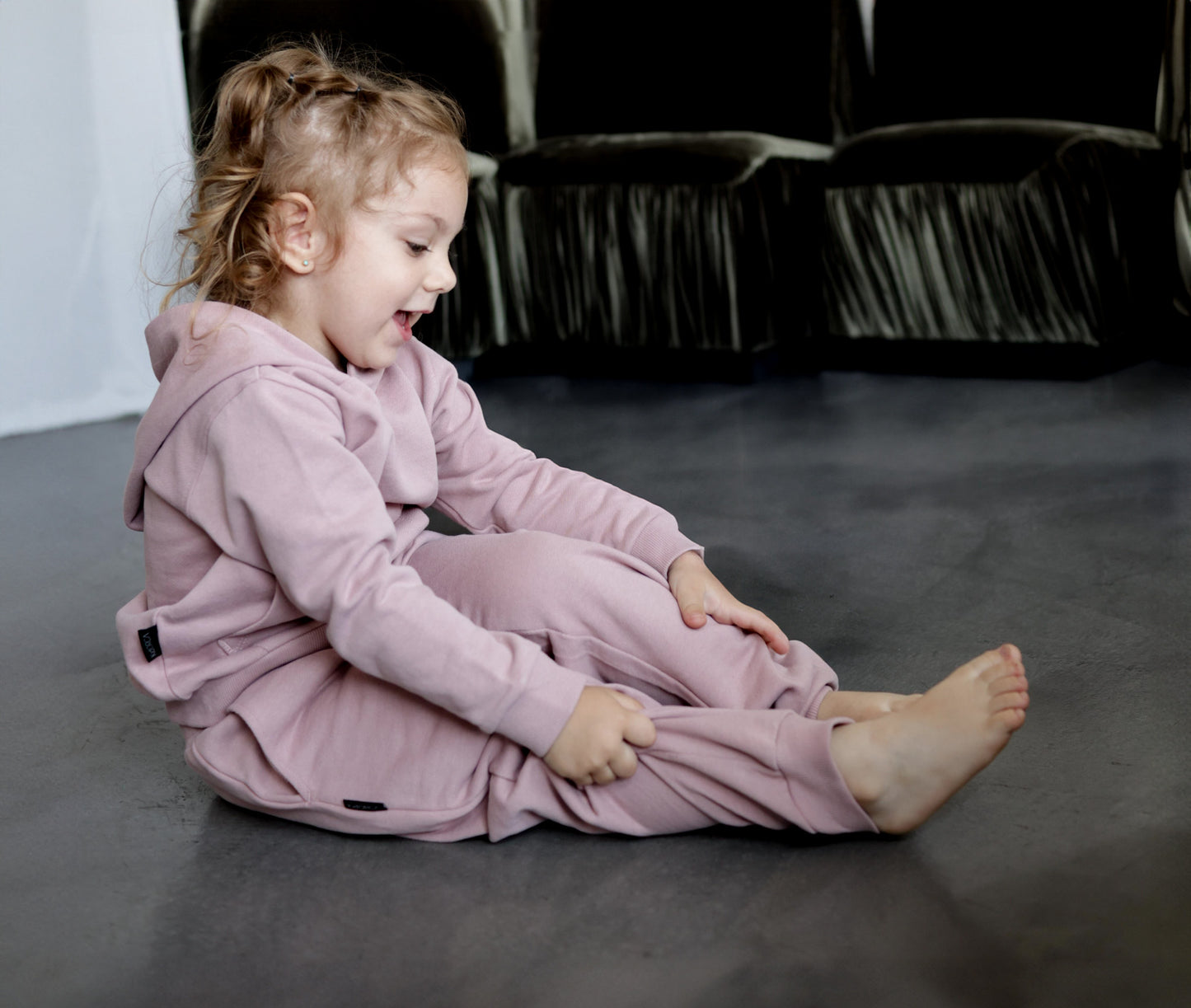Kid playing in mauve french terry sweatpants by KidORCA