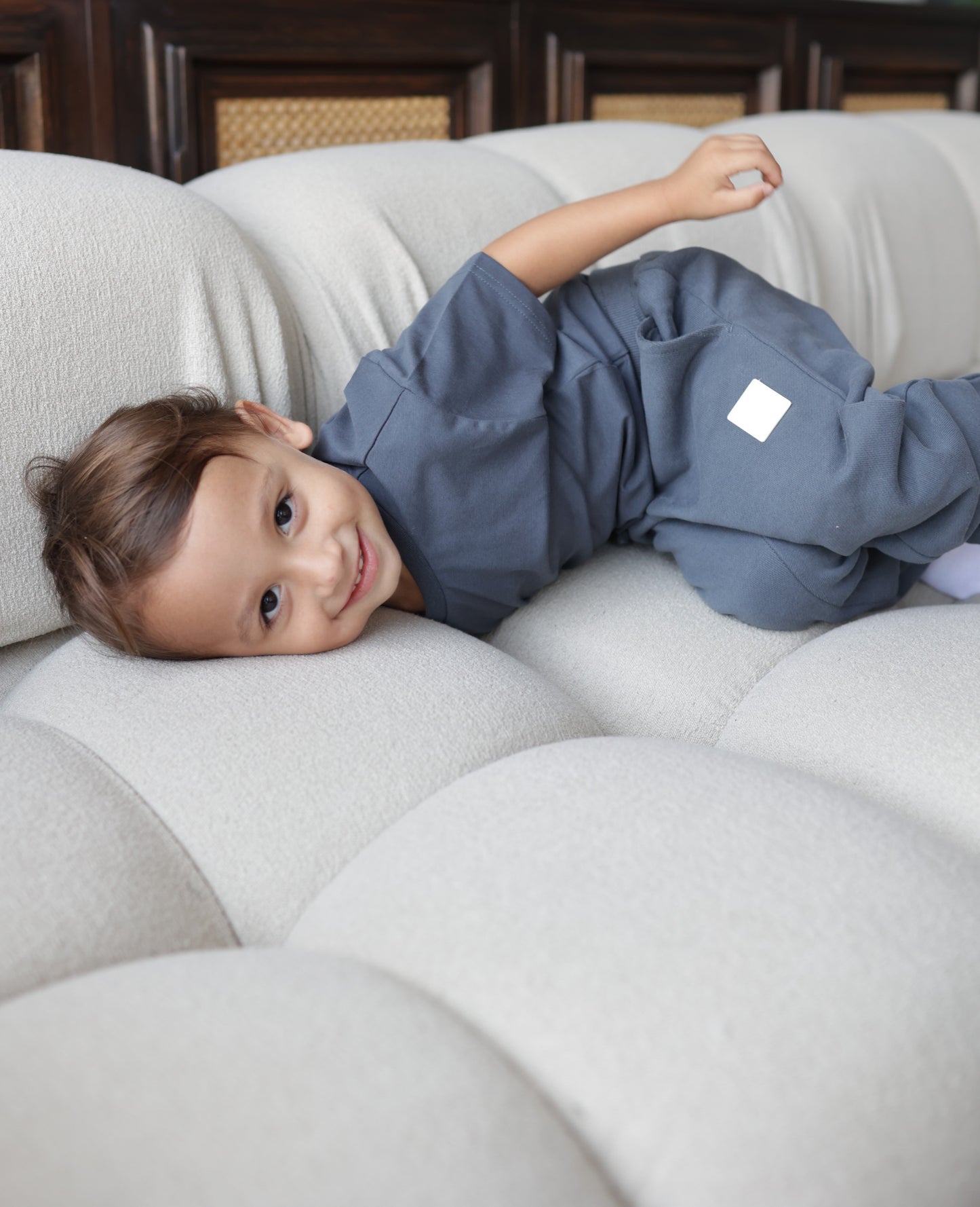 Kid playing in fjord blue french terry sweatpants by KidORCA