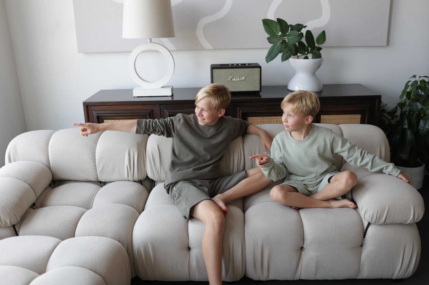 Kid playing in dusty olive french terry shorts by KidORCA