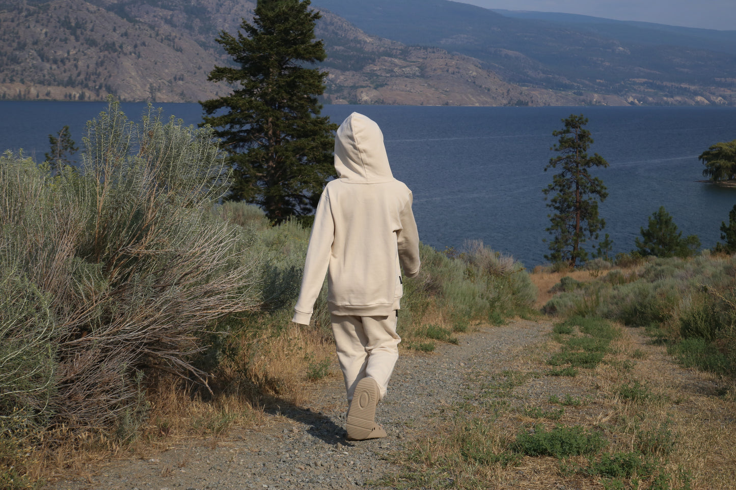 Kid playing in oat french terry hoodie by KidORCA