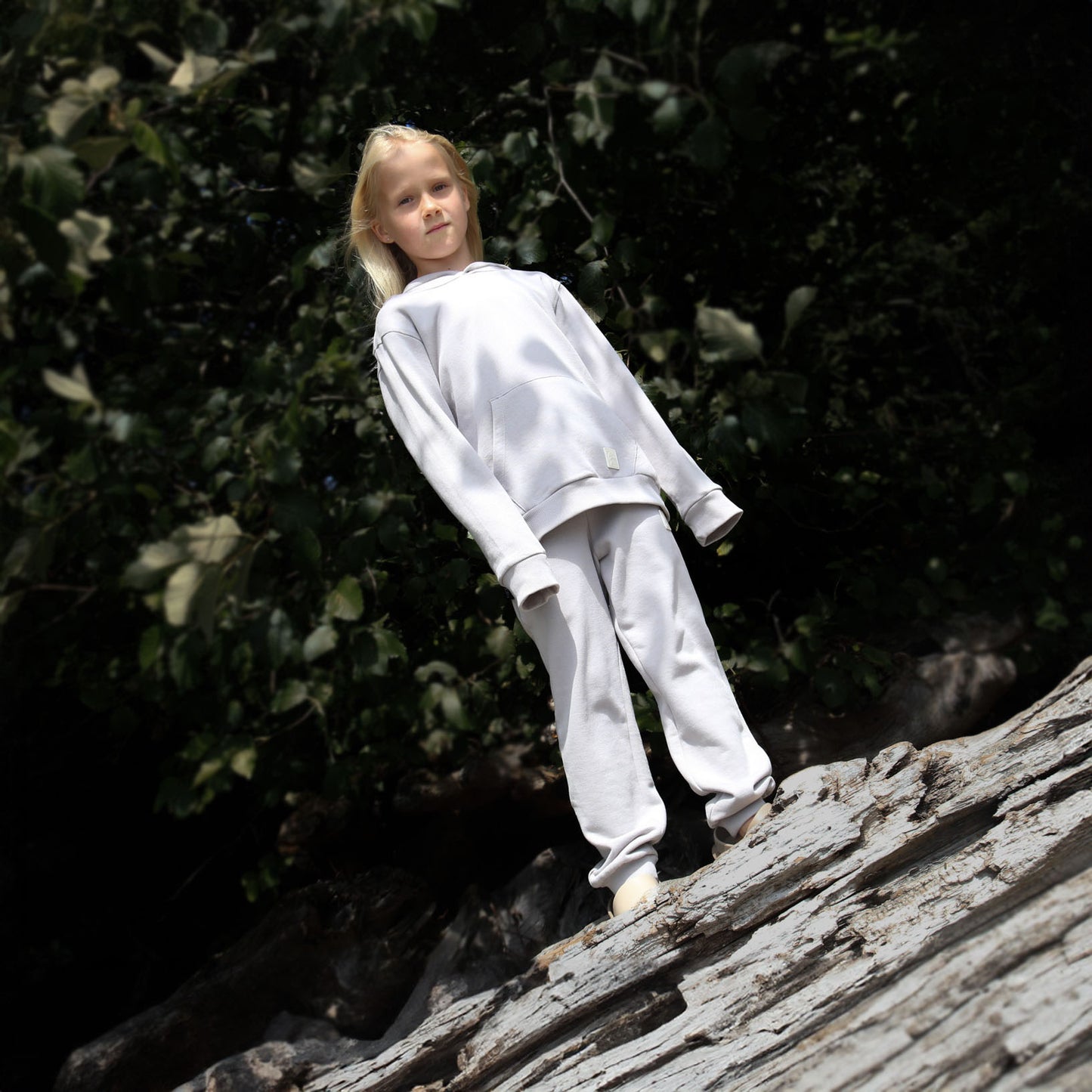 Kid playing in dove grey brushed terry hoodie by KidORCA