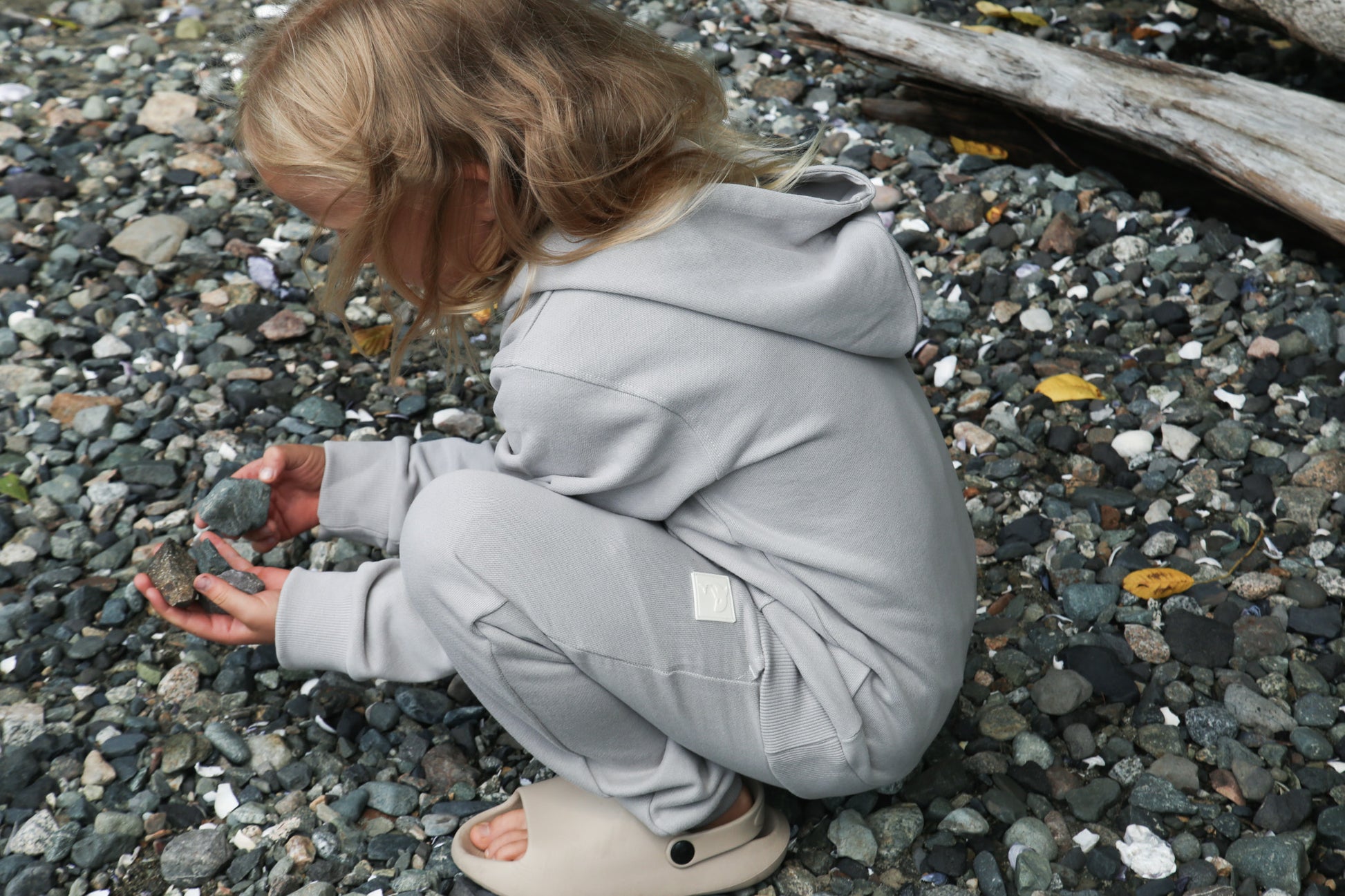 Kid playing in dove grey brushed terry sweatpants by KidORCA