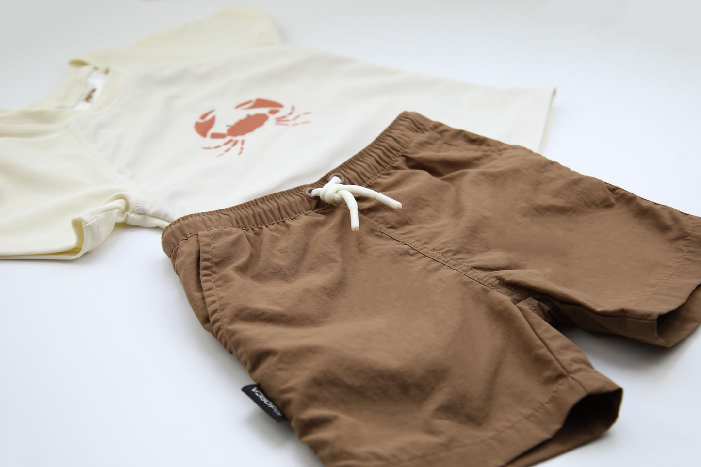 Close-up of UPF 50+ quick-dry recycled polyester – crab rashguard