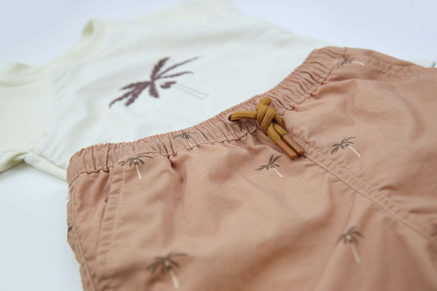 Elastic waistband detail on palm Tuscany boys swim trunks