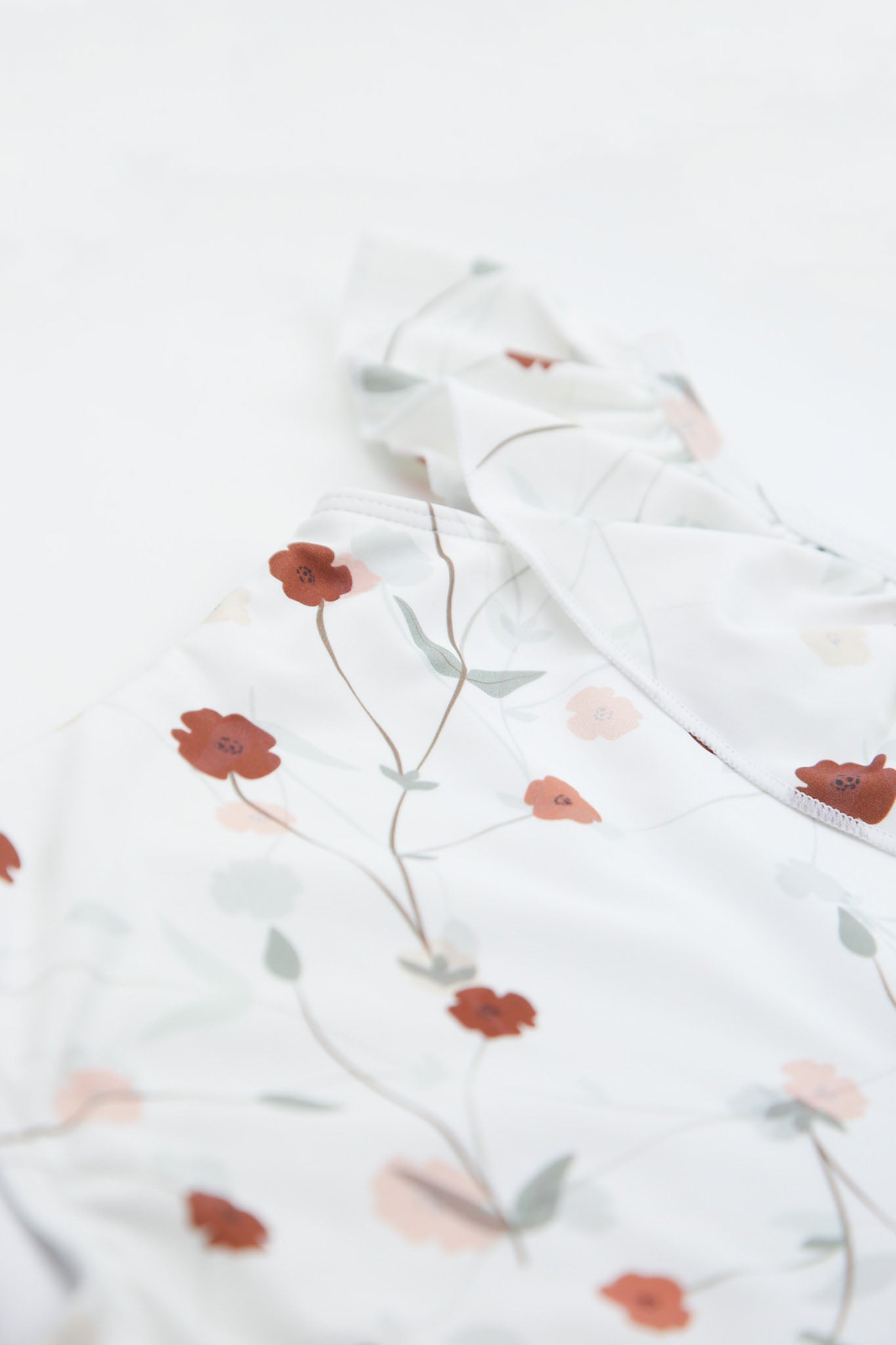 Close-up of coconut print quick-dry fabric – Lalliana ruffle swimsuit