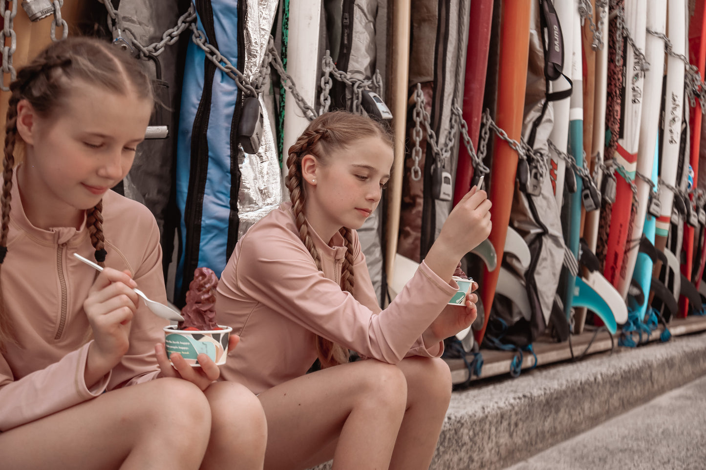 Girl playing in Tuscany print rashguard by KidORCA