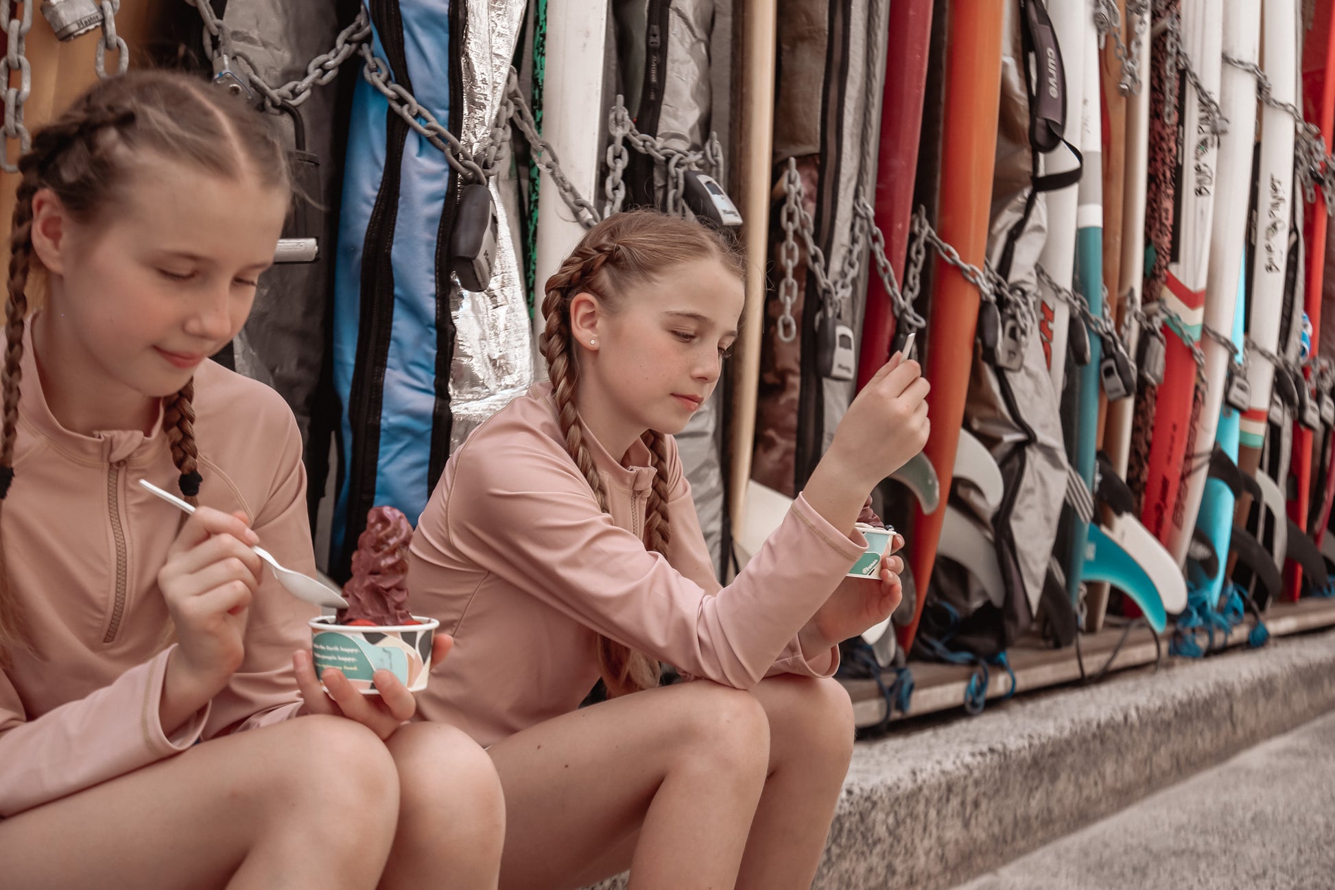 Girl playing in Tuscany print rashguard by KidORCA