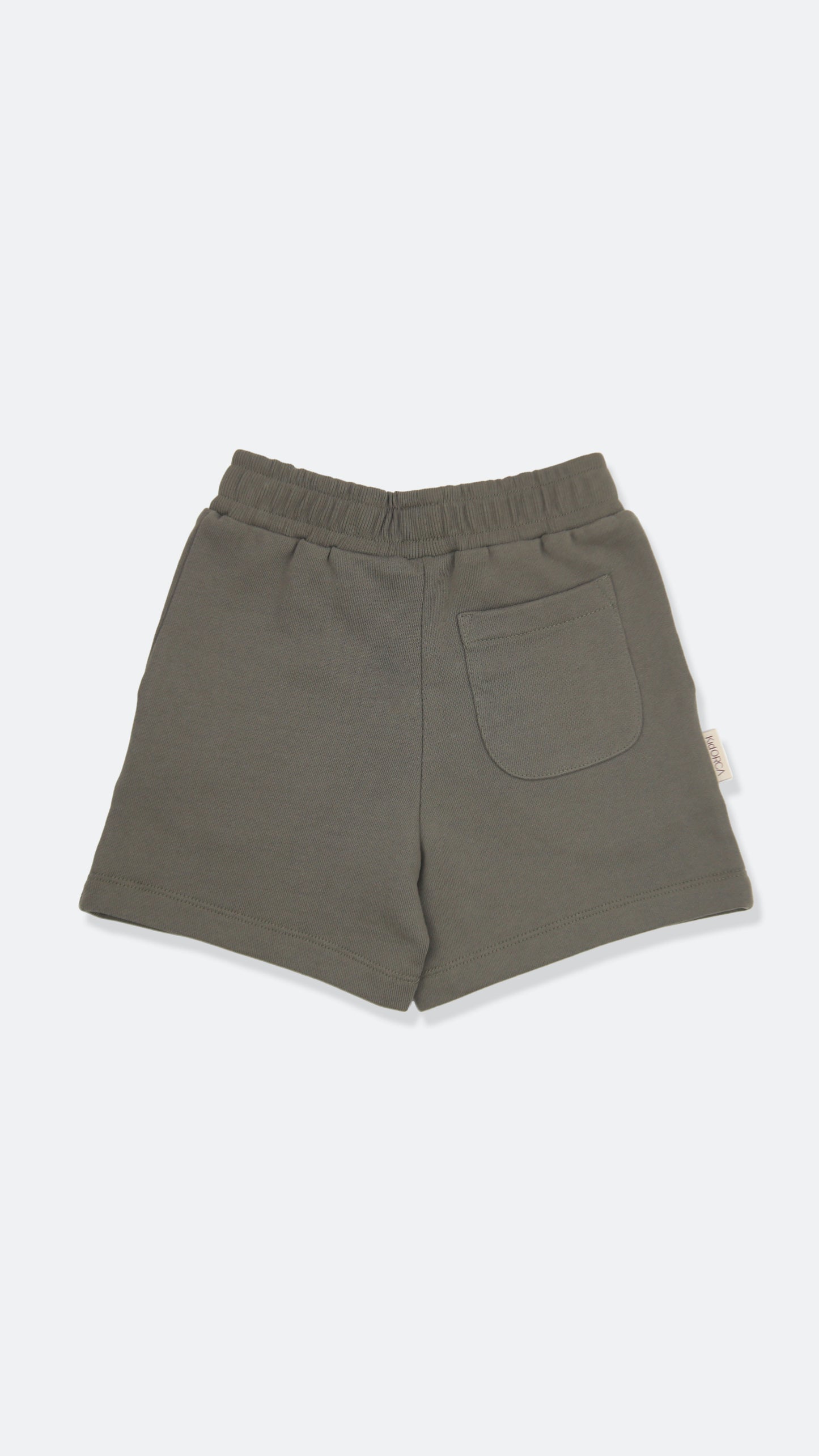 Close-up of french terry fabric and elastic waistband – dusty olive kids shorts
