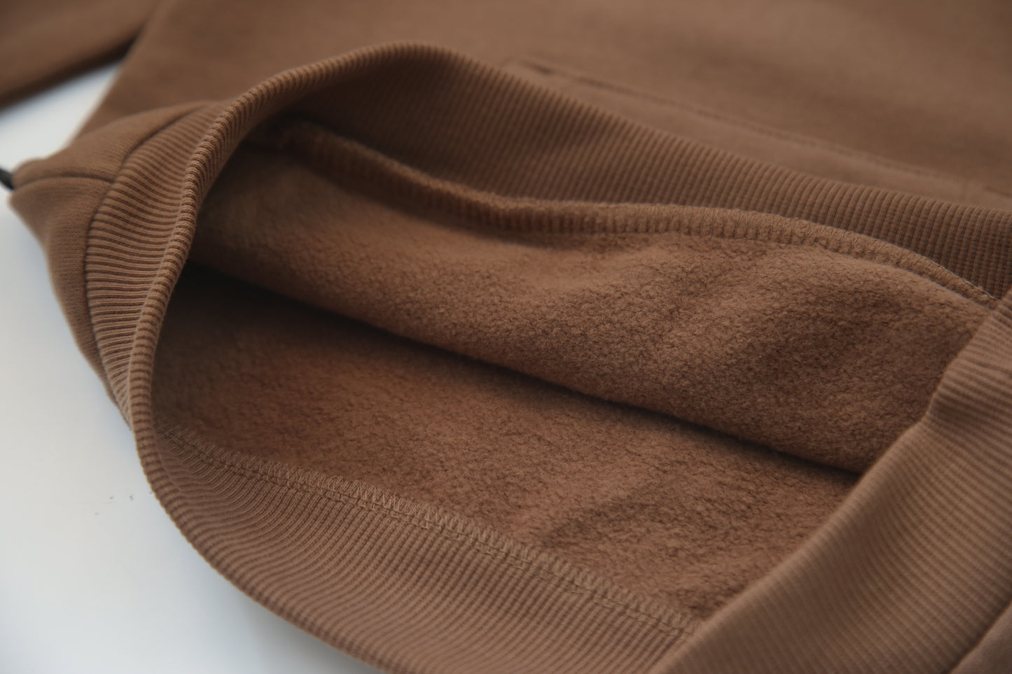 Close-up of brushed terry organic cotton fabric – mocha kids sweatpants