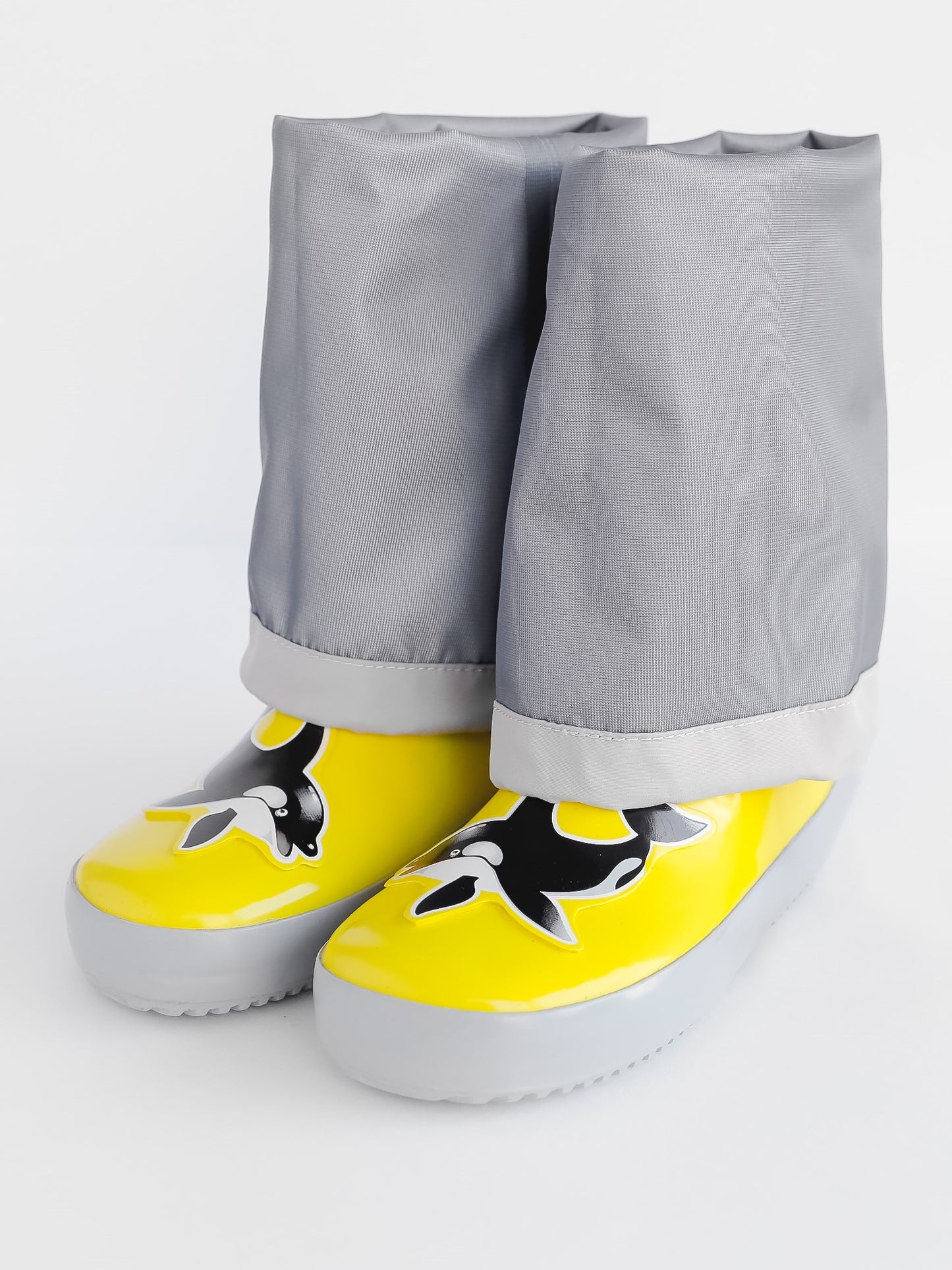 Close-up of waterproof rubber and non-slip sole – yellow rain waders