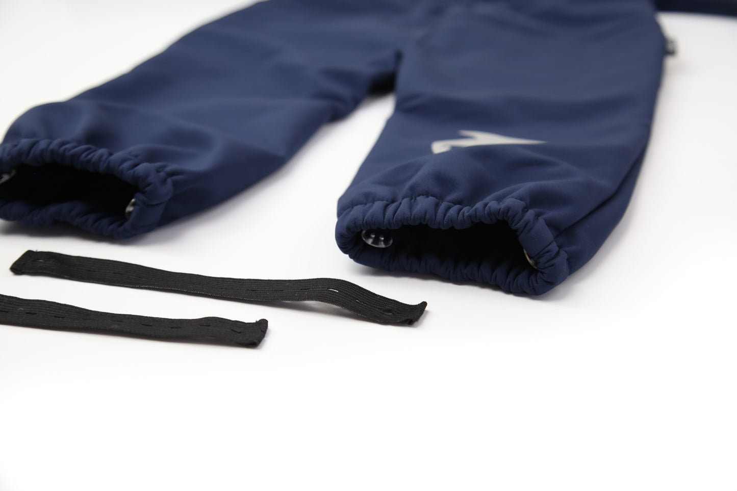 Adjustable straps and full zip detail – navy softshell play suit