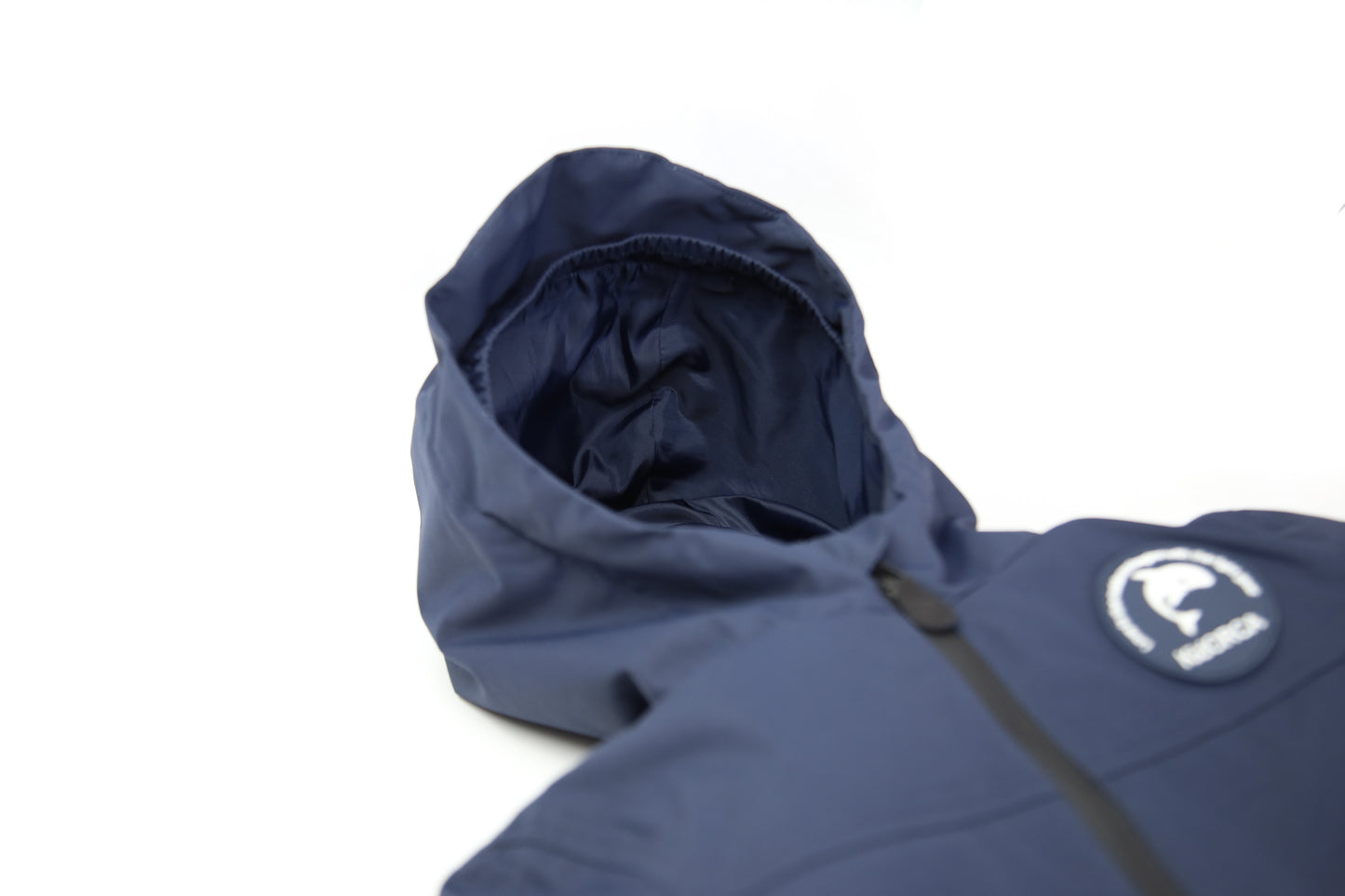 Taped seams and adjustable hood detail – navy hard-shell rain jacket