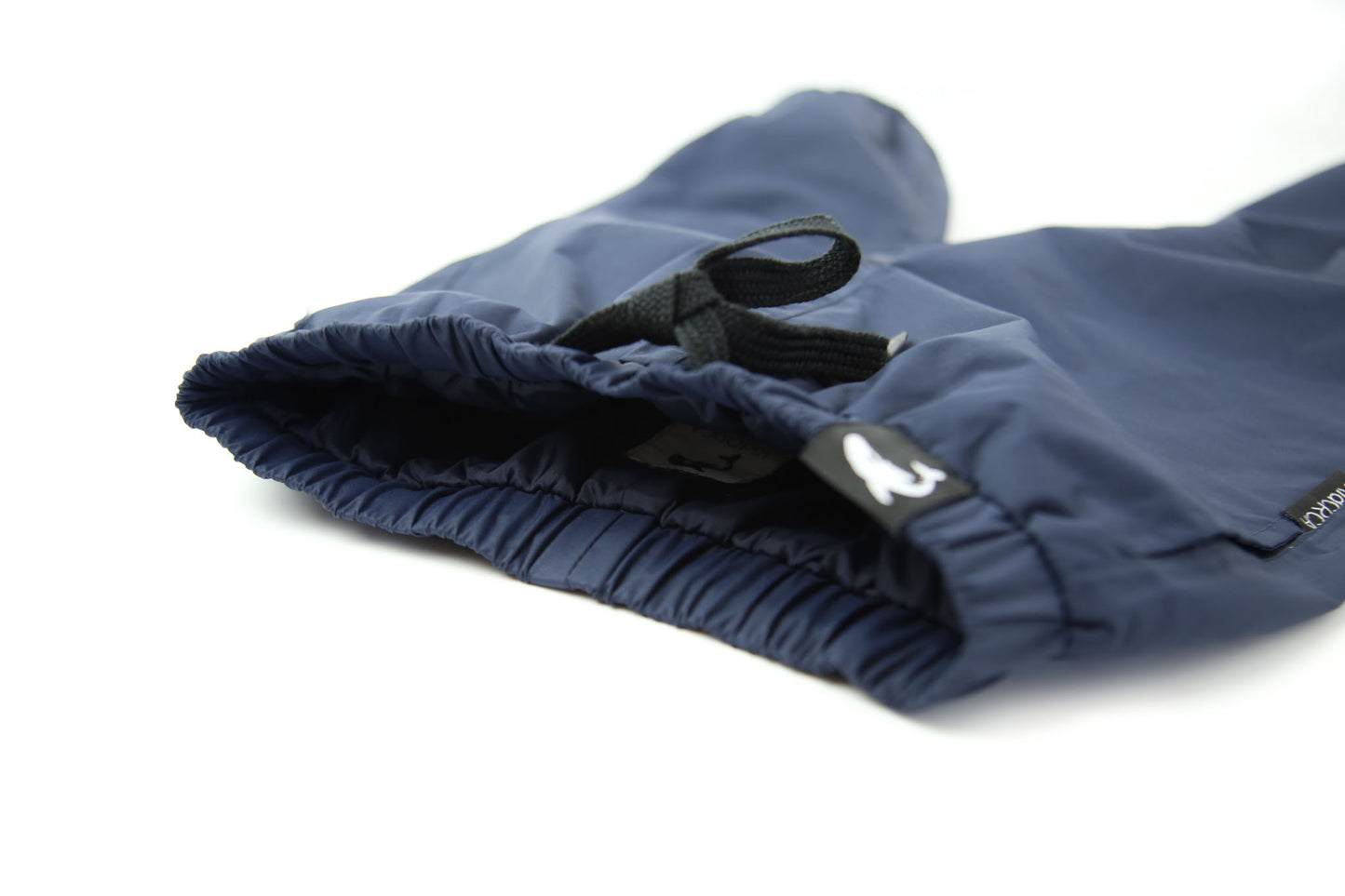 Elastic waistband detail – navy hard-shell rain pants
