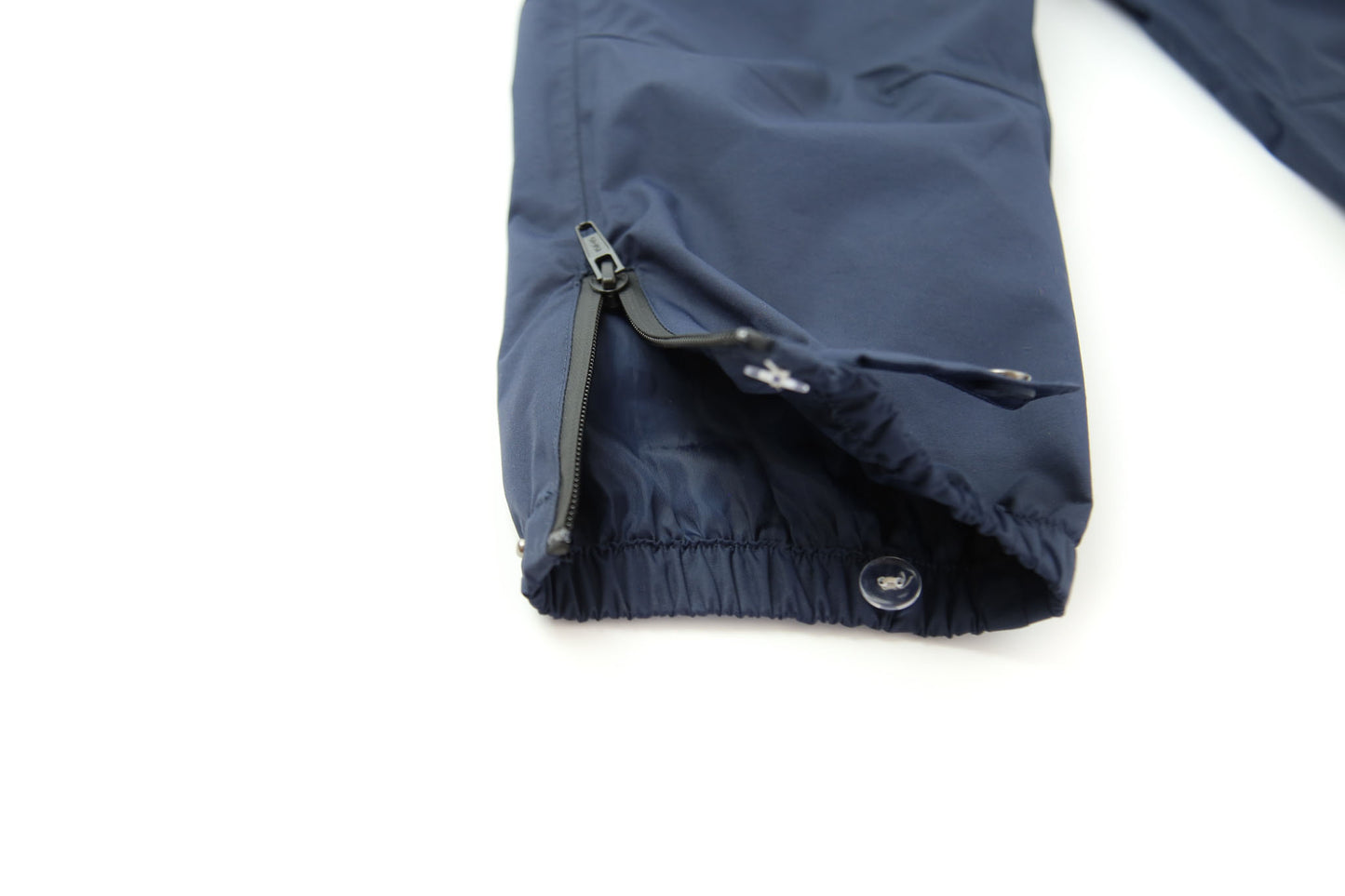 Ankle cuff detail – navy waterproof rain pants