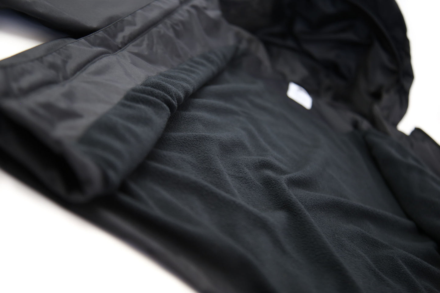 Close-up of insulated lining – black waterproof rain jacket