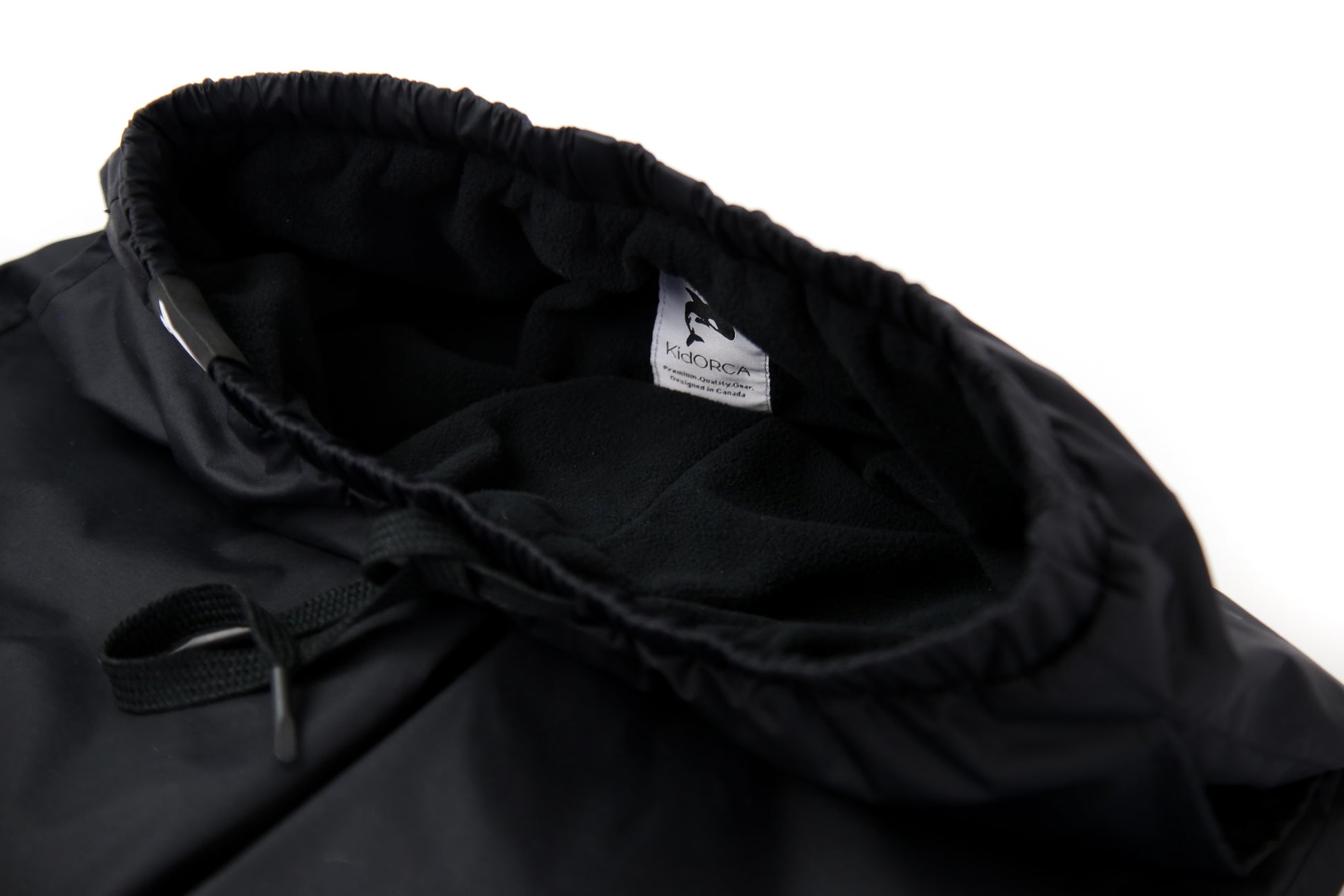 Elastic waistband detail – black insulated rain pants