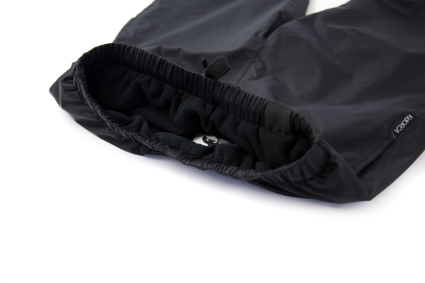 Elastic waistband detail – black insulated rain pants