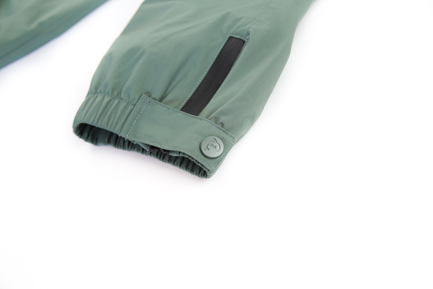 Ankle cuff detail – olive waterproof rain pants