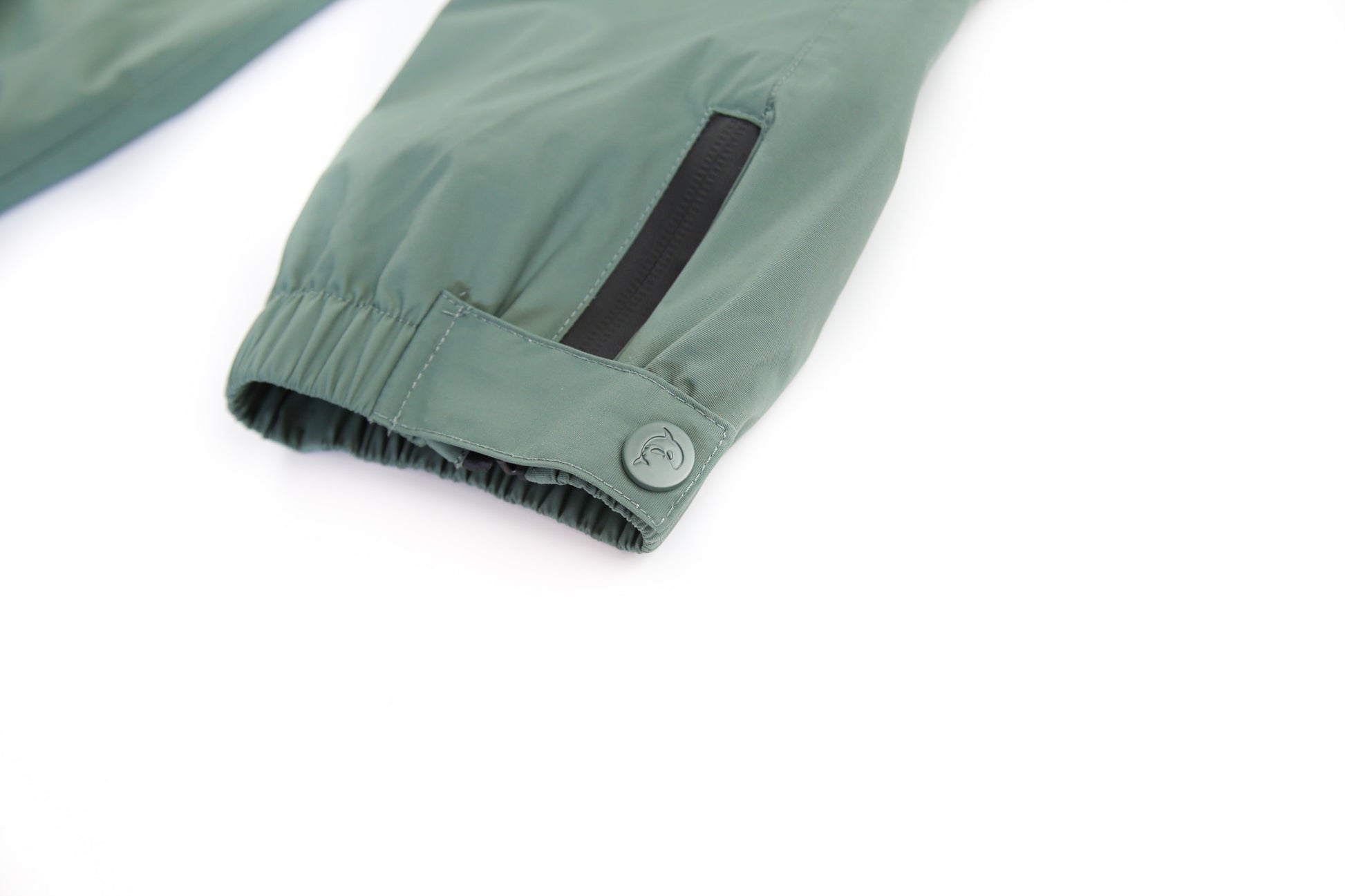 Ankle cuff detail – olive waterproof rain pants