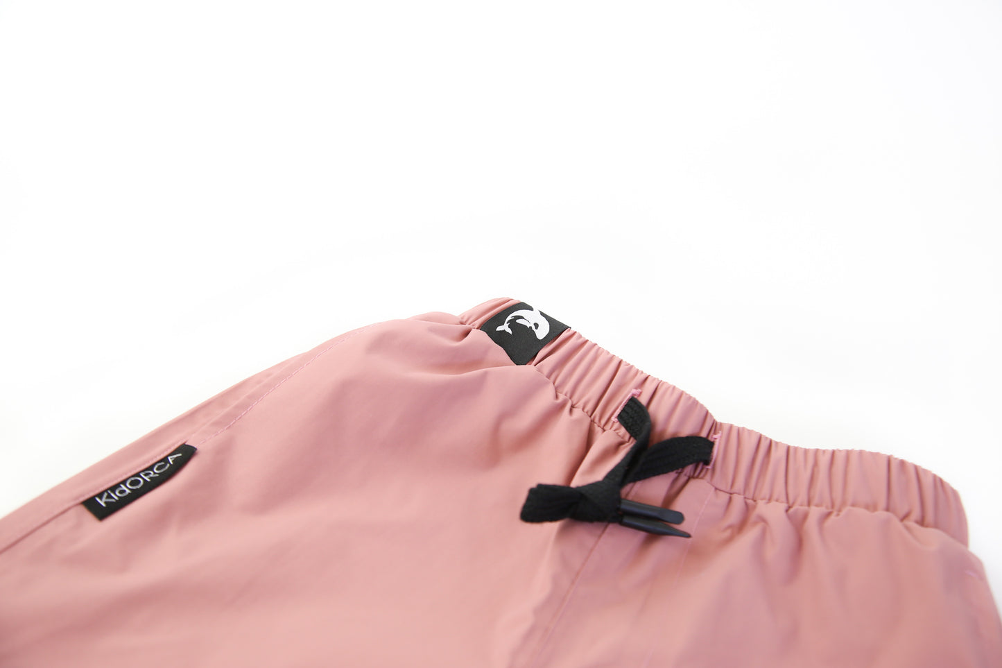 Elastic waistband detail – ash-rose hard-shell rain pants