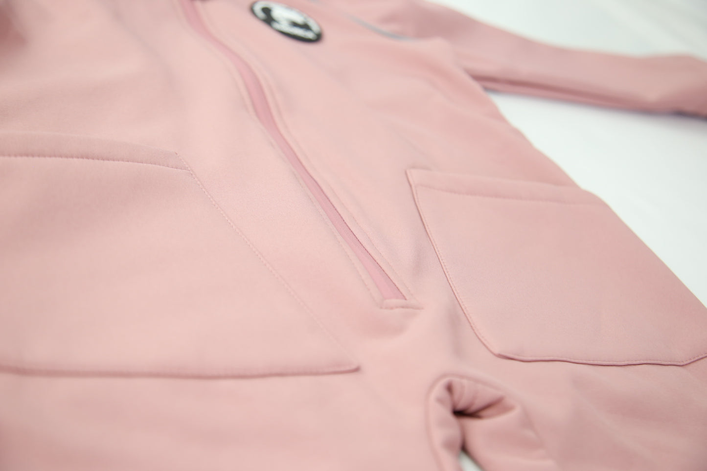 Close-up of waterproof breathable softshell fabric – ash-rose overall