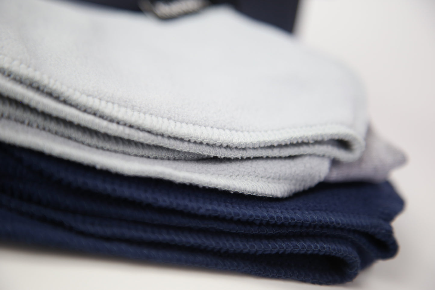 Close-up of grey fleece sock fabric texture – plush and warm