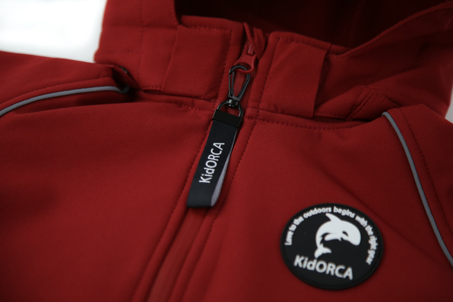 Close-up of waterproof breathable fabric – merlot softshell suit