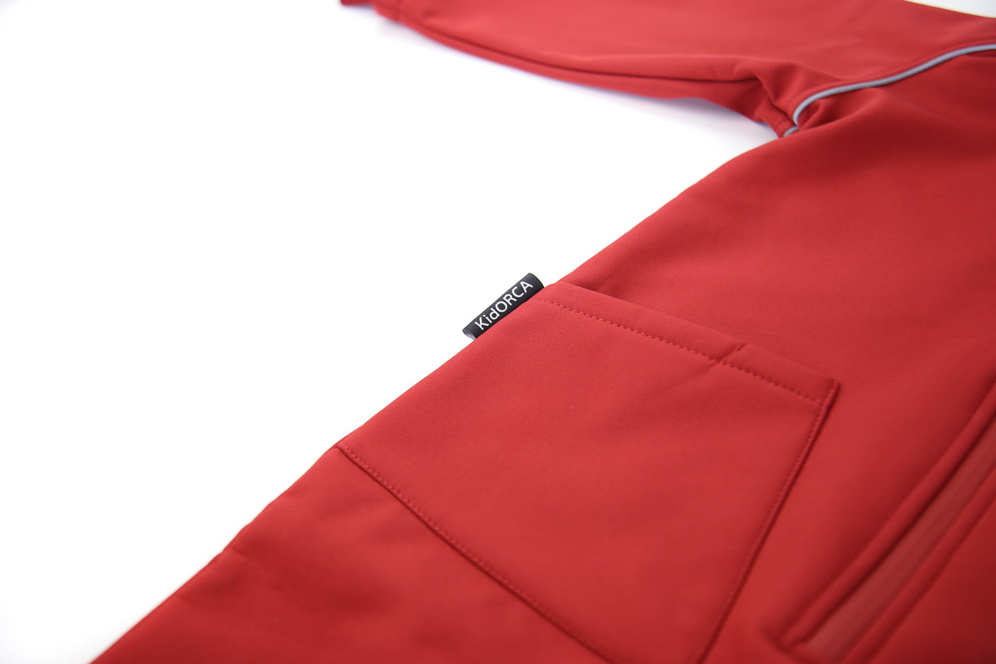 Close-up of waterproof breathable fabric – merlot softshell suit