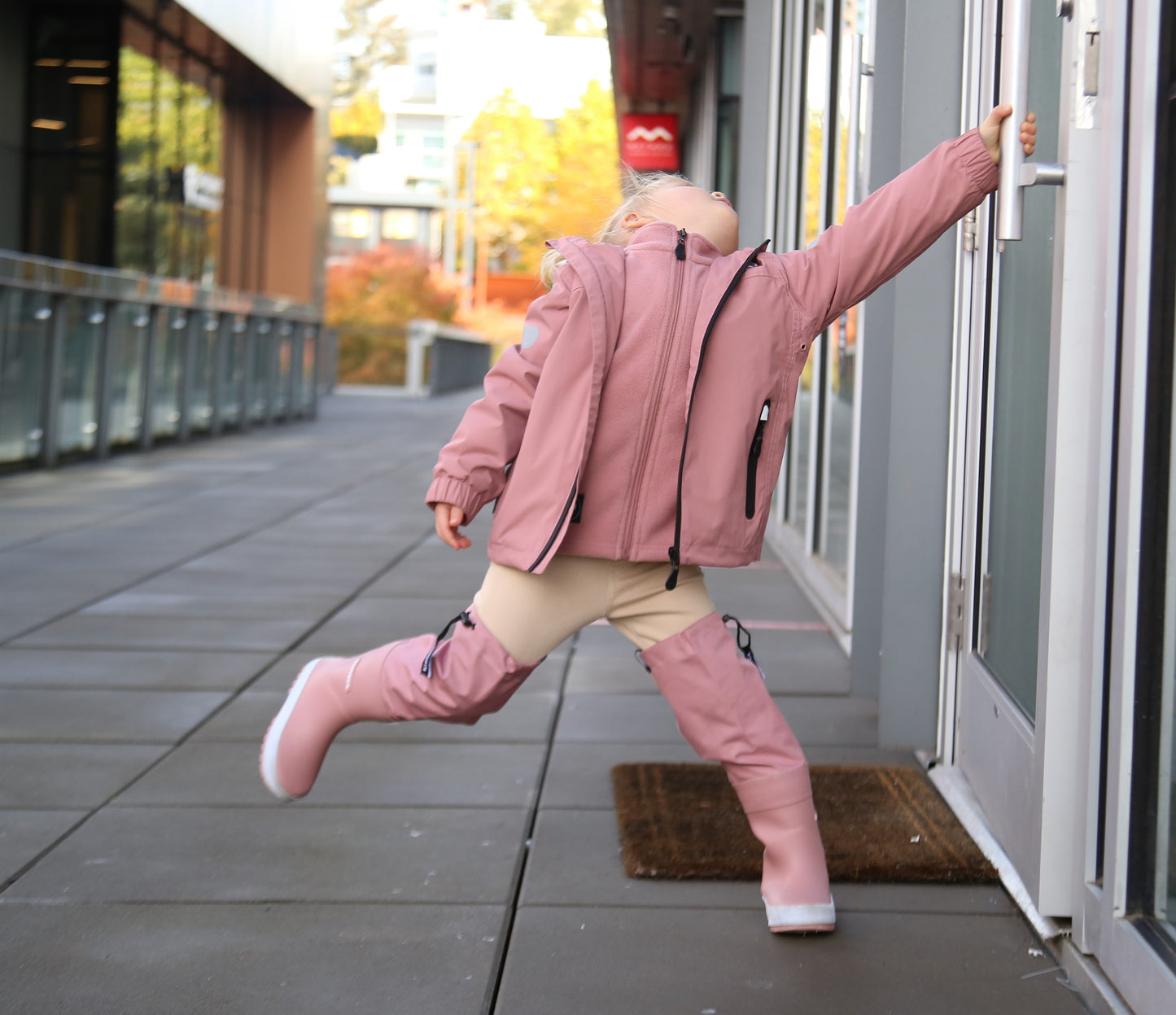Kids ash‑rose waterproof hard‑shell rain jacket – front view