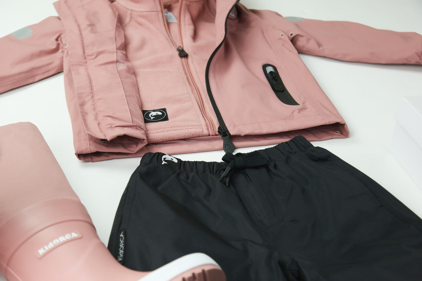 Kids ash‑rose waterproof hard‑shell rain jacket – front view