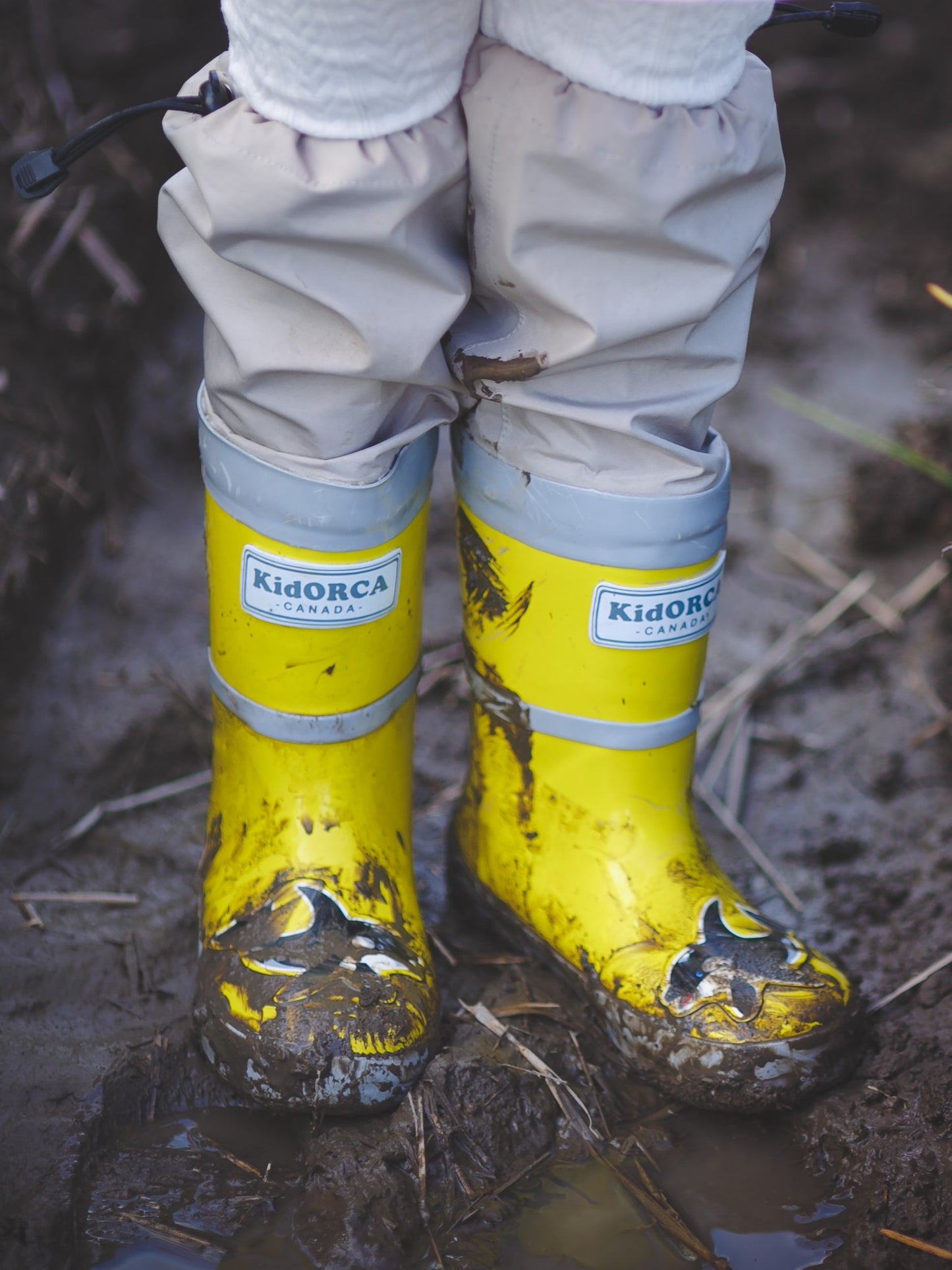 Kids yellow rain boots with above-knee waders – front view