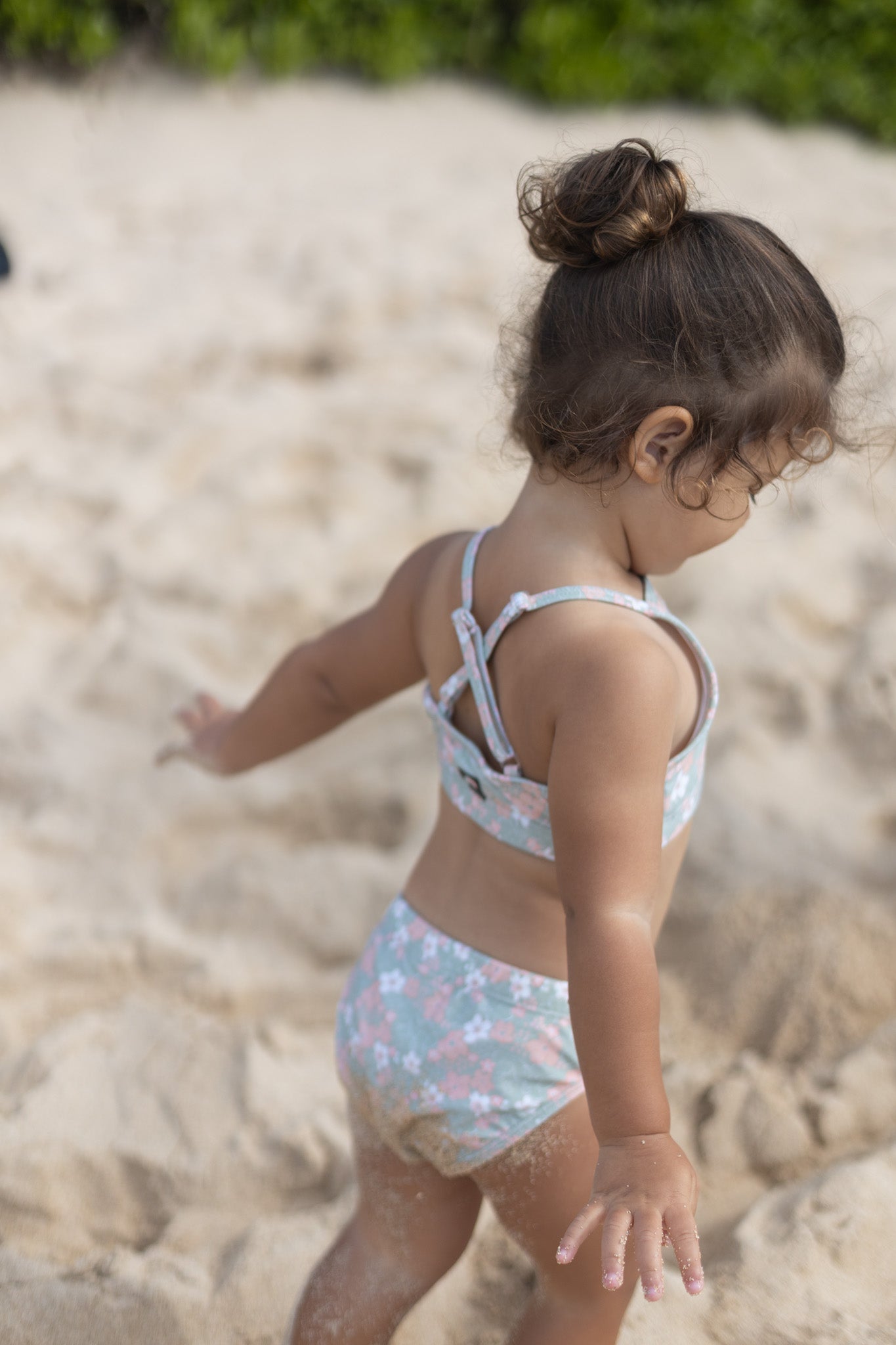 Girl wearing Evangelina sage swim bottom – side view