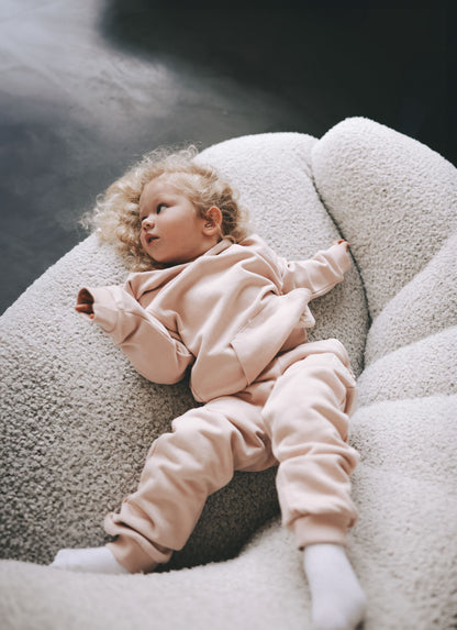 Kid playing in pale rose french terry hoodie by KidORCA