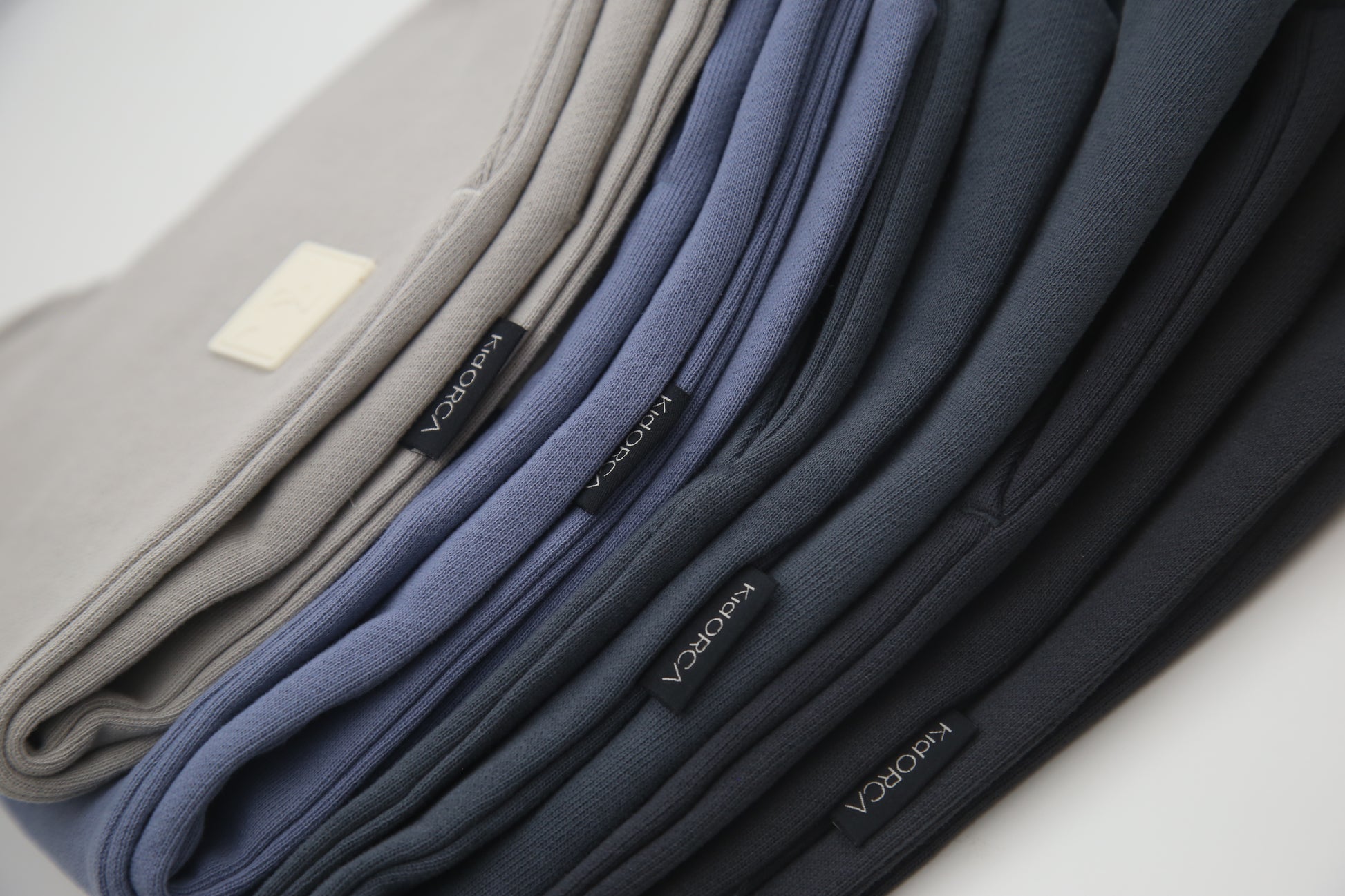 Close-up of organic french terry fabric texture – fjord blue kids sweatpants