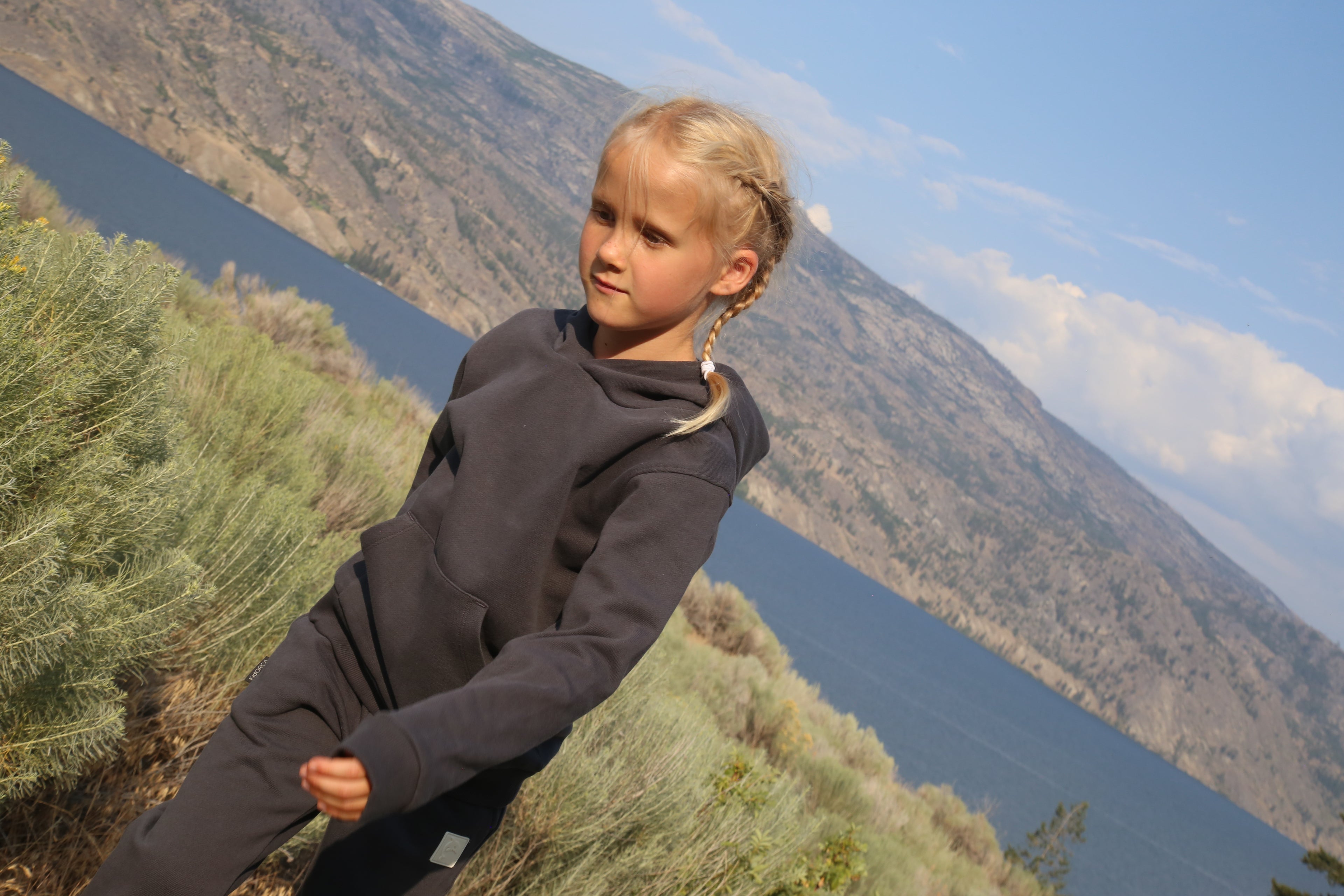 Kid playing in lava brushed terry hoodie by KidORCA