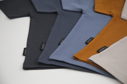 Close-up of organic cotton fabric texture – fjord blue kids tee