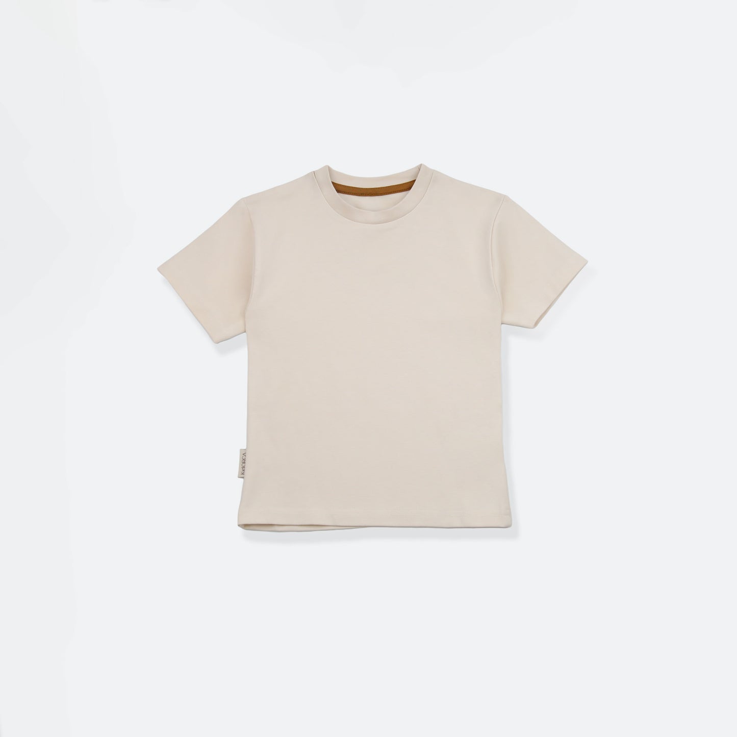 Organic cotton kids tee in oat beige – front view