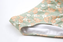 Close-up of quick-dry sage green fabric – Evangelina swim bottom