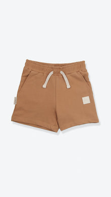 Organic french terry kids shorts in sandstone beige – front view