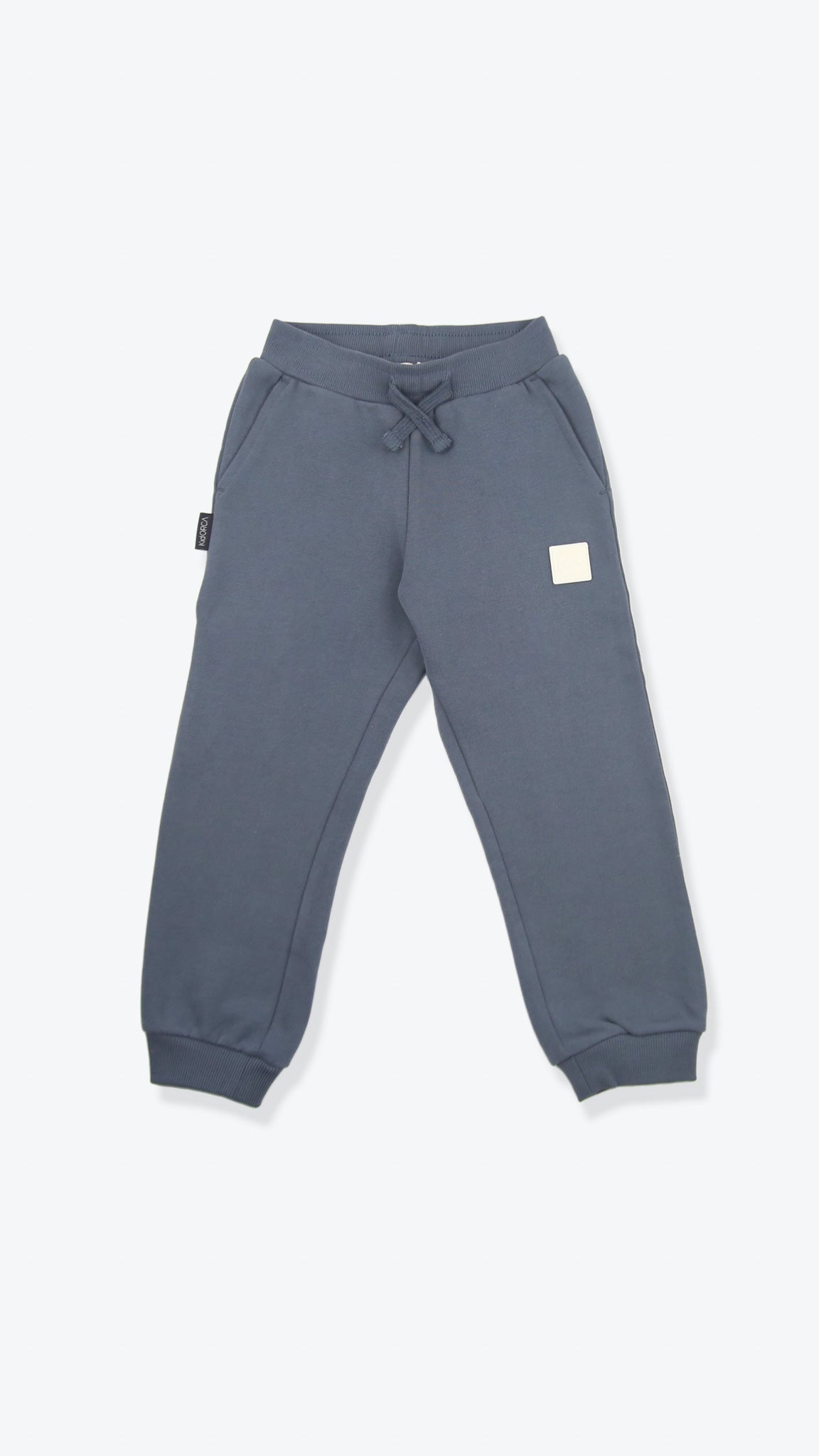 Organic french terry kids sweatpants in fjord blue – front view