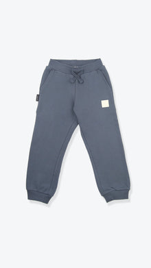 Organic french terry kids sweatpants in fjord blue – front view