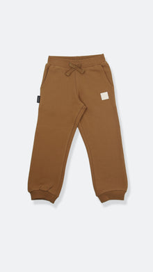 Organic french terry kids sweatpants in ginger color – front view