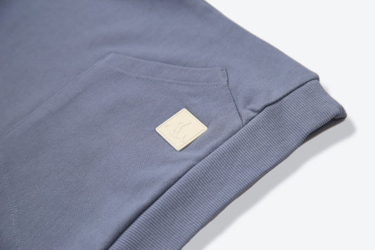 Kangaroo pocket and rib cuff detail on flint french terry kids hoodie