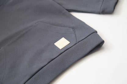 Kangaroo pocket and rib cuff detail on fjord french terry kids hoodie