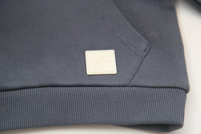 Kangaroo pocket and rib cuff detail on fjord french terry kids hoodie